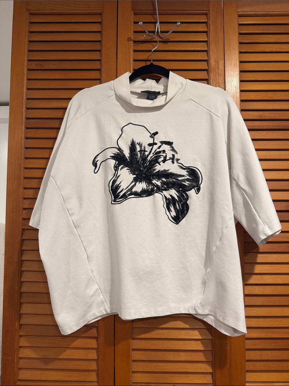 Gracia White Top with Black Floral Graphic